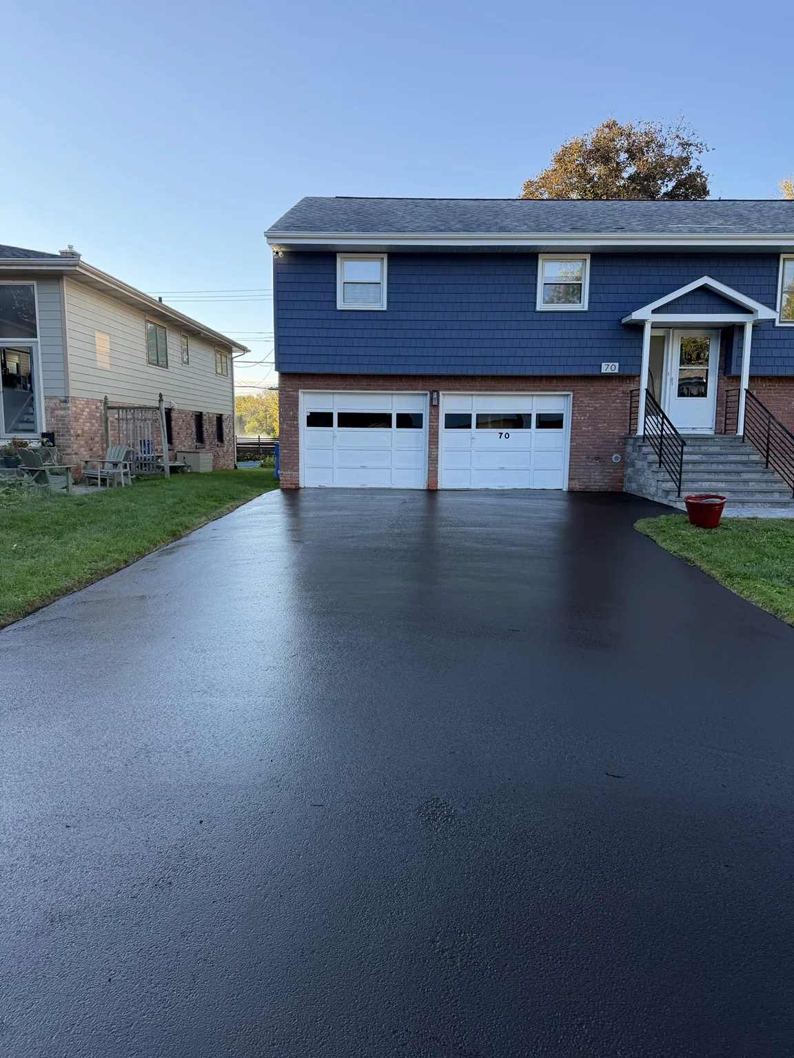 Residential driveway sealcoating